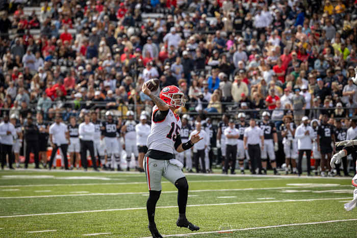 Carson Beck Throws for a completion on the road vs Vanderbilt / Photo Brooks Austin